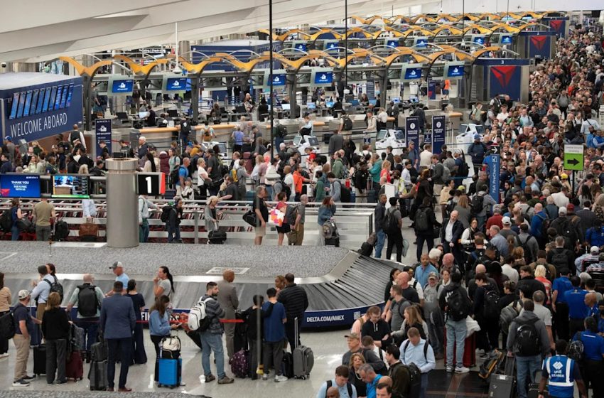  Long TSA wait times persist despite ICE deployment as a potential deal to end the shutdown takes shape: Latest updates