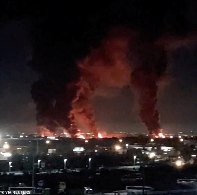 Smoke rises from the direction of Mehrabad airport, Tehran, on Tuesday, before the ceasefire