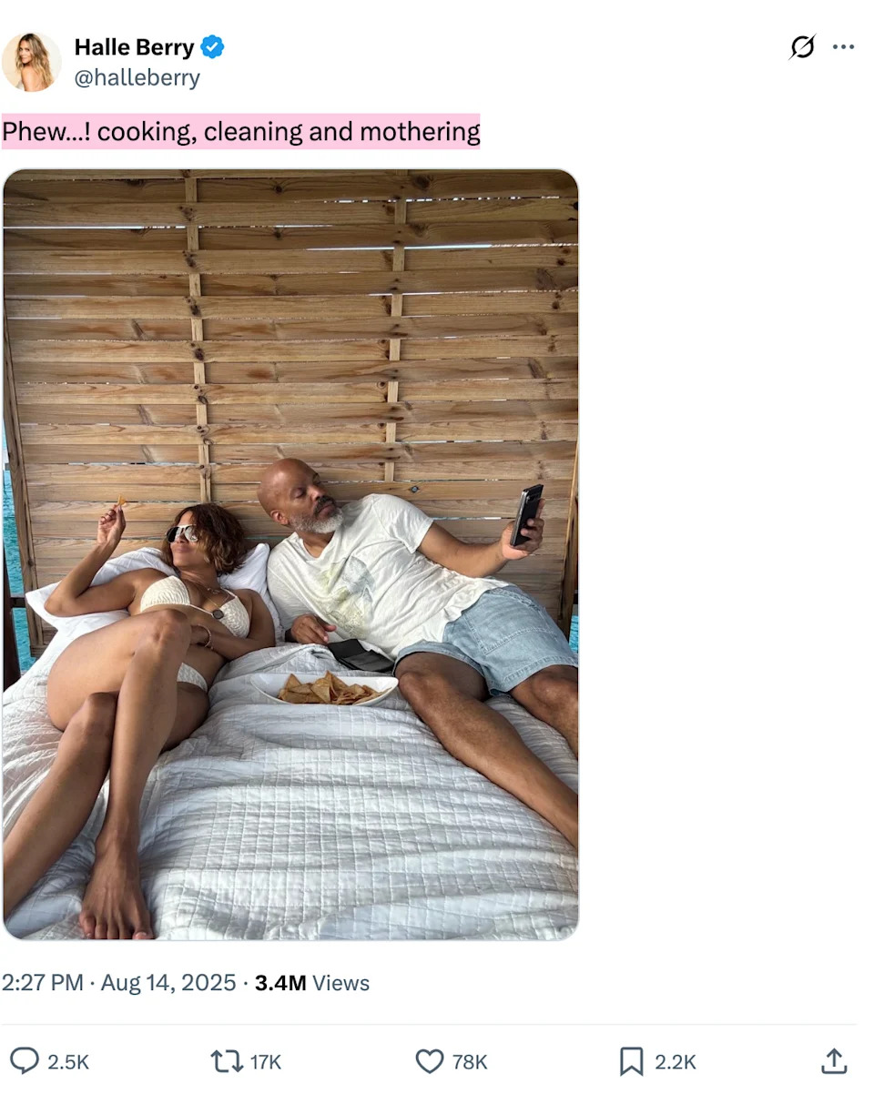Halle and Van in swimwear, relaxing on a bed outdoors, him holding a phone. Caption: "Phew...! cooking, cleaning and mothering"