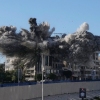 Smoke rises after an Israeli airstrike hits a building near the airport road in Beirut, Lebanon, Tuesday.