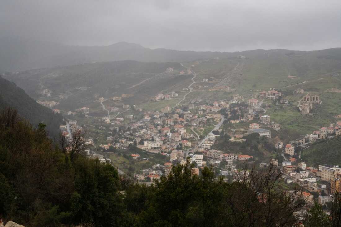 A view of parts of Southern Lebanon from a hill in Jezzine. Jezzine is outside the evacuation zone in the south and waves of displaced people are arriving and staying or passing through the town as they leave their homes behind.