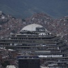 Venezuela's National Intelligence Service (SEBIN) headquarters, known as El Helicoide, stands in front of La Cota 905 neighborhood in Caracas, Venezuela, Sept. 12, 2022. 