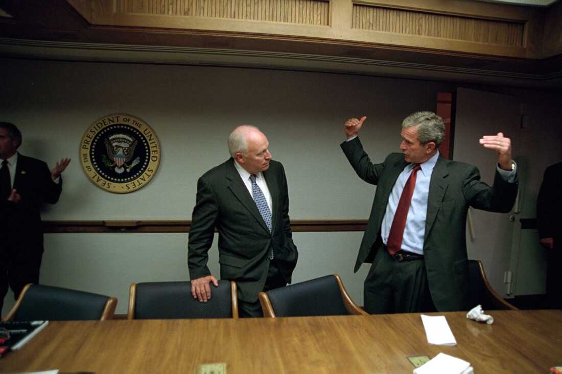 President Bush talks with Vice President Dick Cheney in the Presidential Emergency Operations Center on Sept. 11, 2001.