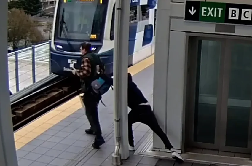  Moment man tries to push person in front of train captured on video