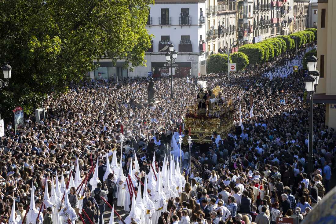 The brotherhood of San Gonzalo crosses Isabel II bridge, known as âPuente de Trianaâ on their way to the Cathedral on the second official day of the Holy Week celebrations at Sevilla, Spain on March 30, 2026.
