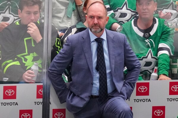 Dallas Stars head coach Peter DeBoer looks on during the third period in Game 2 of the Western Conference finals in the NHL hockey Stanley Cup playoffs, Friday, May 23, 2025, in Dallas. (AP Photo/LM Otero, File)