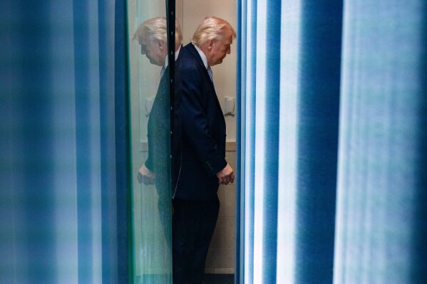 President Donald Trump departs after speaking with reporters in the James Brady Press Briefing Room at the White House, Monday, April 6, 2026, in Washington. (AP Photo/Alex Brandon)