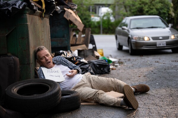 This image released by Disney shows Bryan Cranston in a scene from "Malcolm in the Middle: Life's Still Unfair." (David Bukach/Disney via AP)