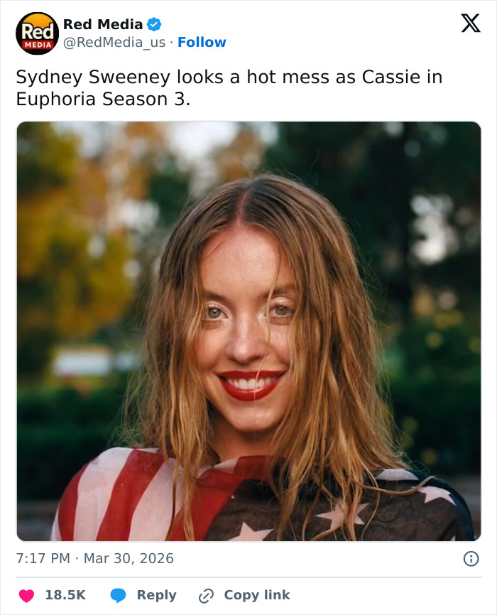 Sydney Sweeney wrapped in American flag with wet hair, showcasing her controversial look in Euphoria Season 3.