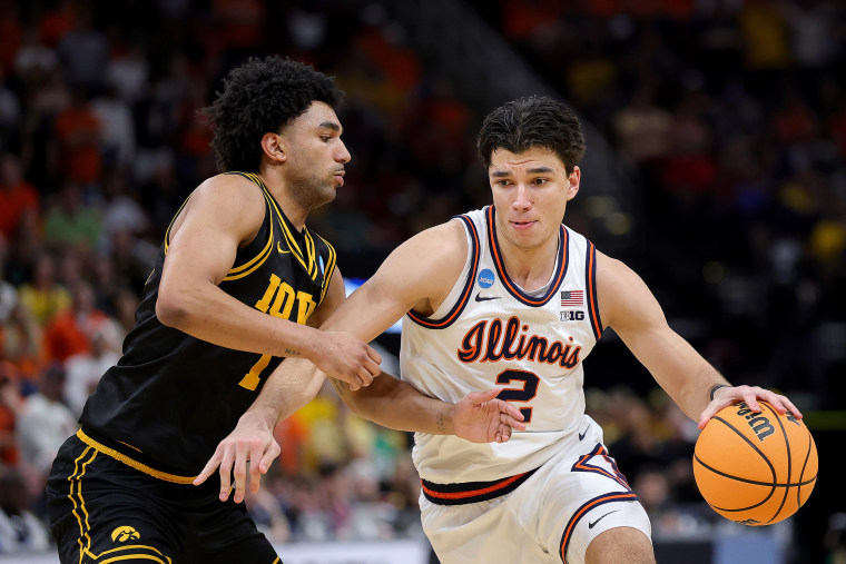 On-court action during an NCAA basketball game.