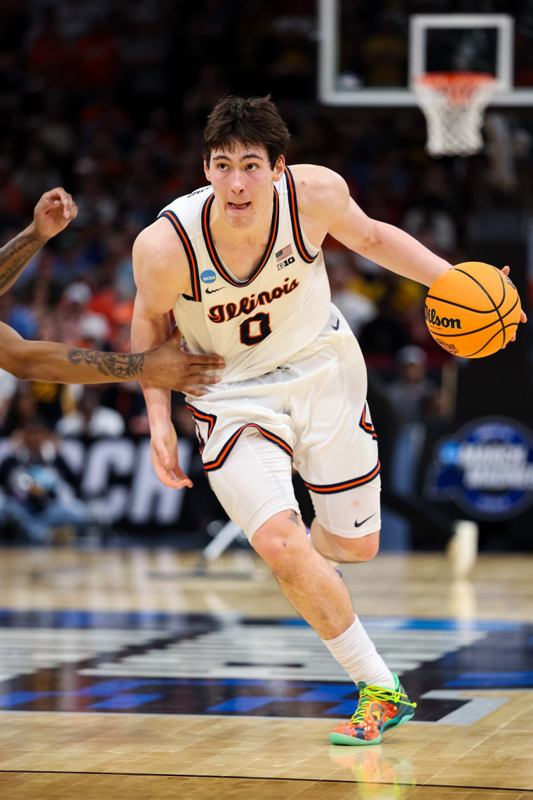 On-court action during an NCAA basketball game.