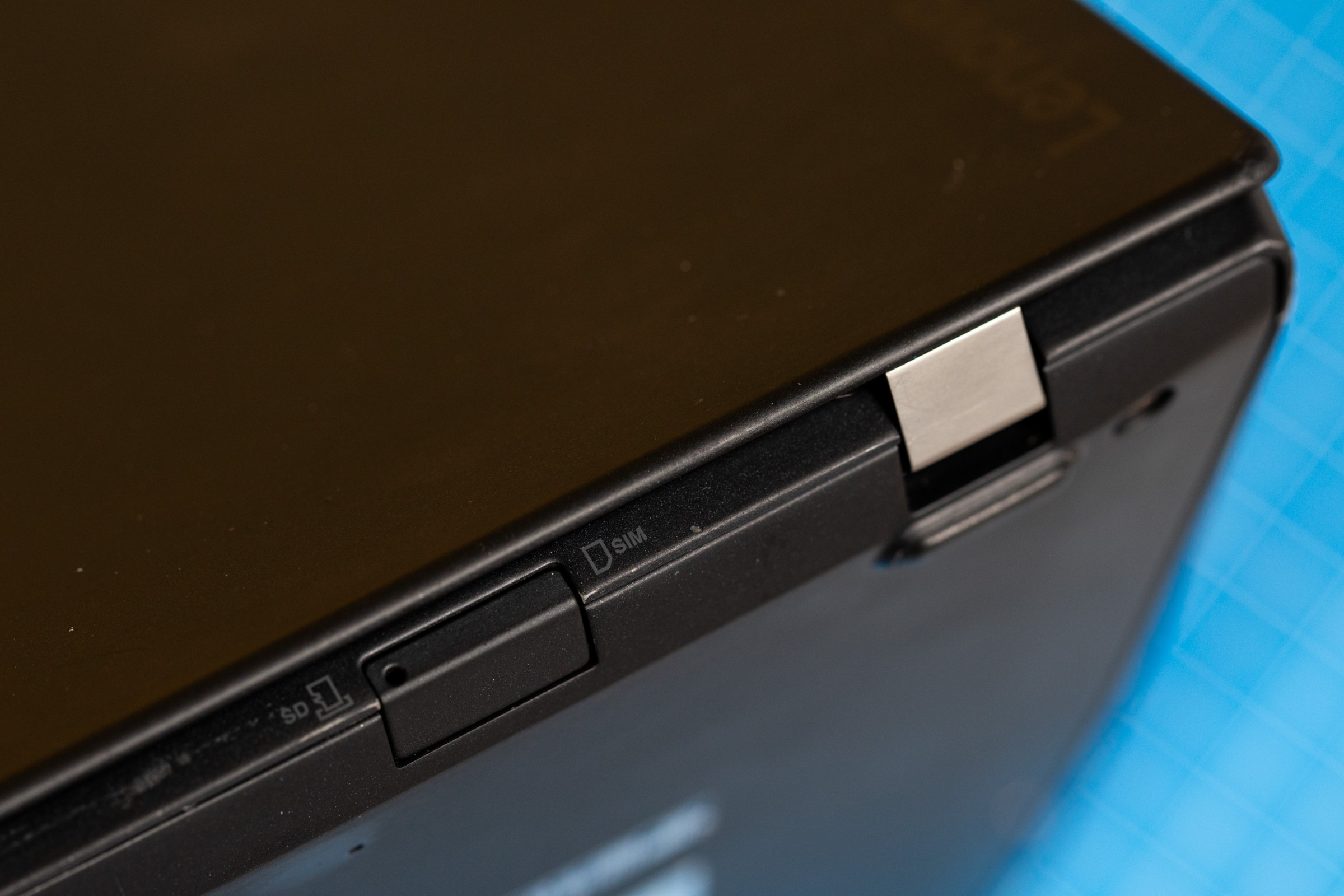 The ThinkPad even has a hidden microSD card/SIM slot on the back!