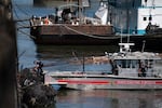 Portland Fire and Rescue crew members undock their rescue boat at the scene of the car crash into the Willamette River in Portland, Ore., on April 6, 2026.