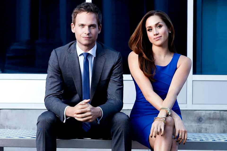 Patrick J. Adams as Mike Ross and Meghan Markle as Rachel Zane on season 2 of