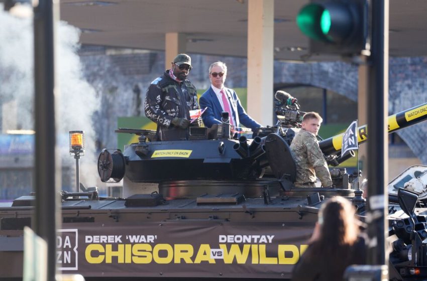  Chisora rides tank with Farage to press event for Wilder fight