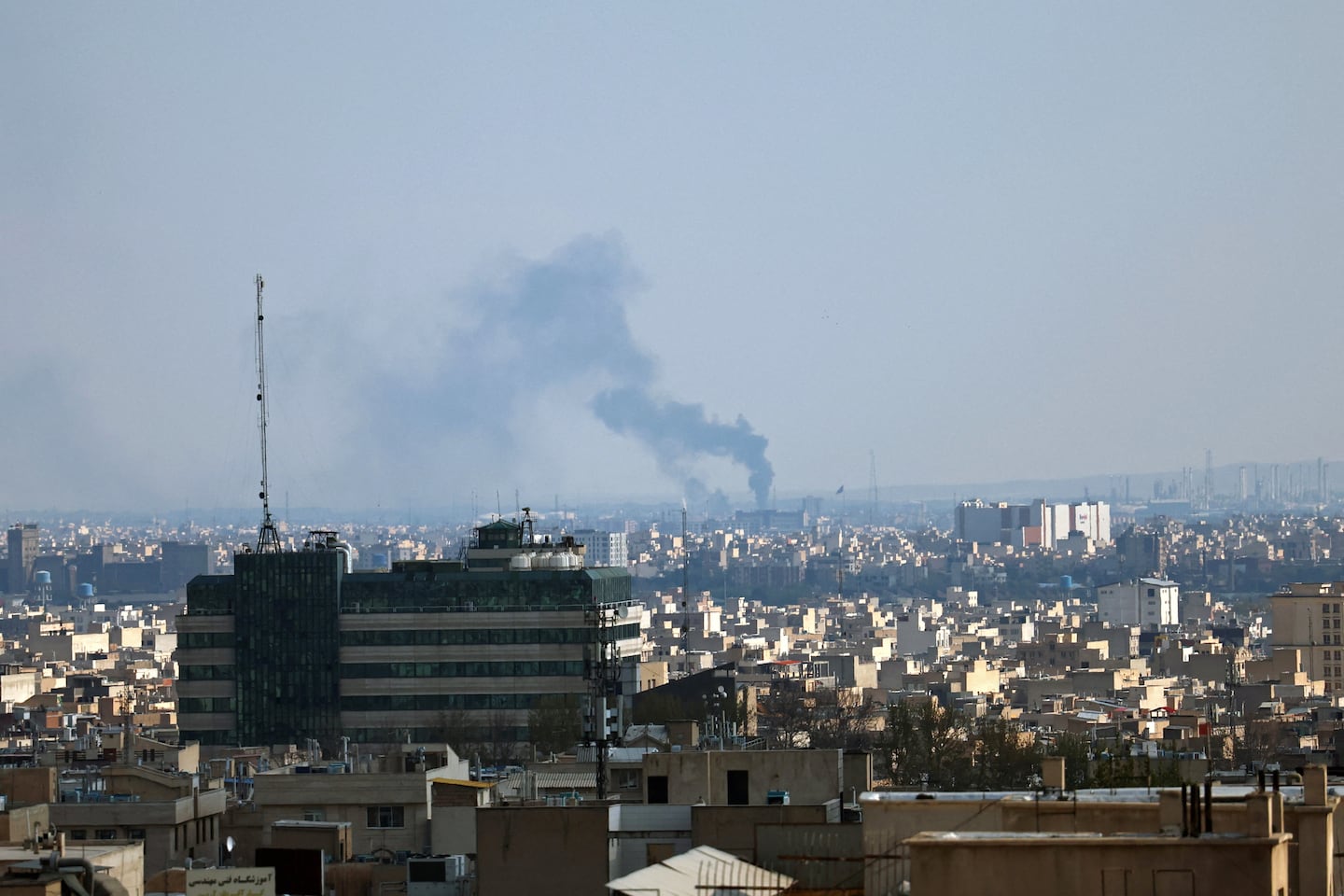 Smoke rises from the site of a strike in Tehran on April 1, 2026.