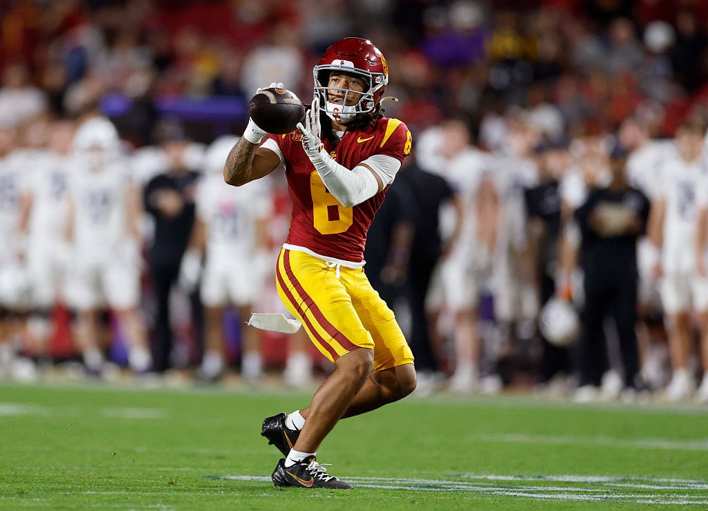 LOS ANGELES, CALIFORNIA - NOVEMBER 07: Makai Lemon #6 of the Southern California Trojans catches a pass during a 38-17 win over the Northwestern Wildcats at Los Angeles Memorial Coliseum on November 07, 2025 in Los Angeles, California. (Photo by Harry How/Getty Images)