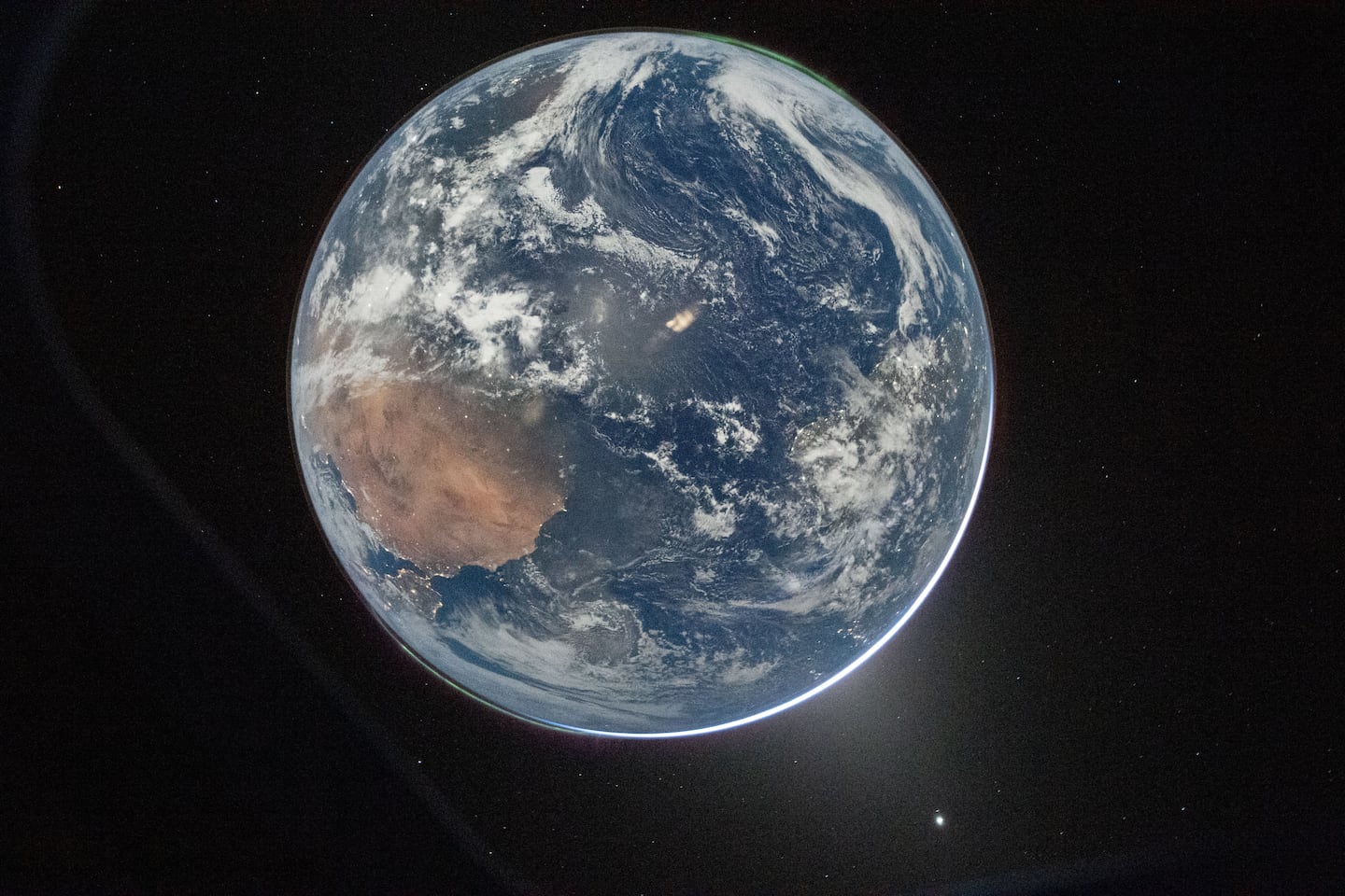 Artemis II Commander Reid Wiseman took this picture of Earth from the Orion spacecraft's window on Thursday, April 2.