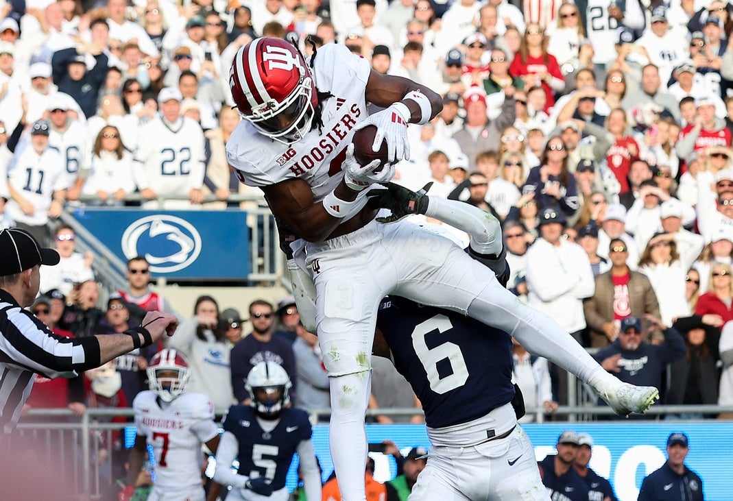 Nov 8, 2025; University Park, Pennsylvania, USA; Indiana Hoosiers wide receiver Omar Cooper Jr. (3) makes a catch in the end zone for a touchdown during the fourth quarter against the Penn State Nittany Lions at Beaver Stadium. Mandatory Credit: Matthew O'Haren-Imagn Images
