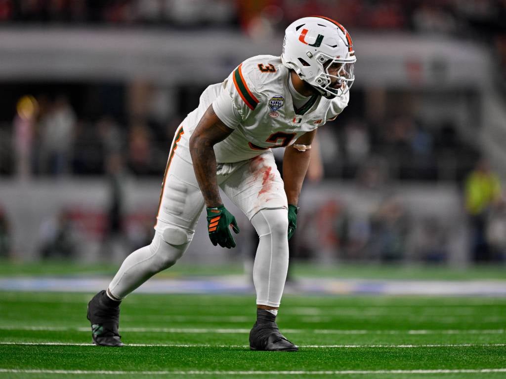 Dec 31, 2025; Arlington, TX, USA; Miami Hurricanes defensive lineman Akheem Mesidor (3) gets into position during the 2025 Cotton Bowl and quarterfinal game of the College Football Playoff at AT&T Stadium. Mandatory Credit: Jerome Miron-Imagn Images