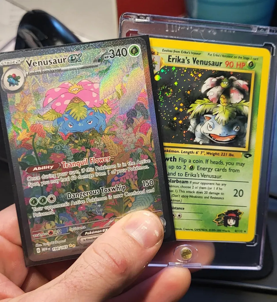 Two Pokémon cards: a Venusaur EX with glittery design and Erika's Venusaur featuring a floral illustration, both encased in protective sleeves