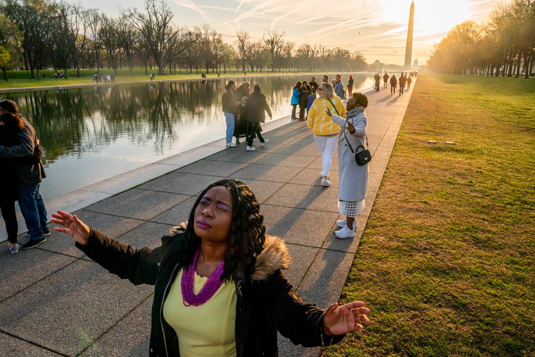 Worshipers listen to a sermon by Mark Batterson, lead pastor of National Community Church, during a sunrise Easter service at the Lincoln Memorial in Washington on March 31, 2024.