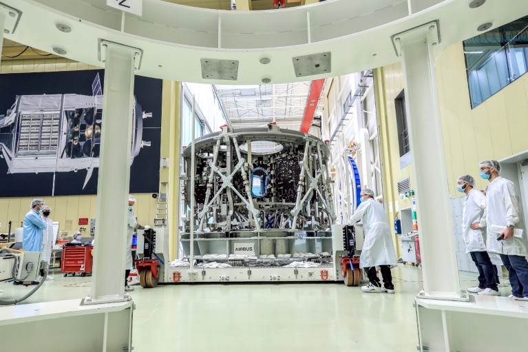 Wide-angle view of the European Service Module structure arriving at the Airbus integration hall in Germany.