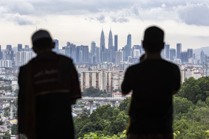 Skyscrapers and offices surrounded by residential buildings on the city's skyline in Kuala Lumpur, Malaysia, on January 14. 2024.