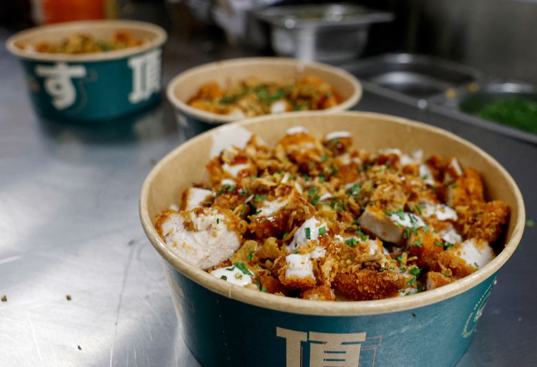 The Krousty Sabaïdi fast food chain has enticed French diners with a dish featuring fried chicken tenders served over rice, pictured above, which it claims to have invented.
