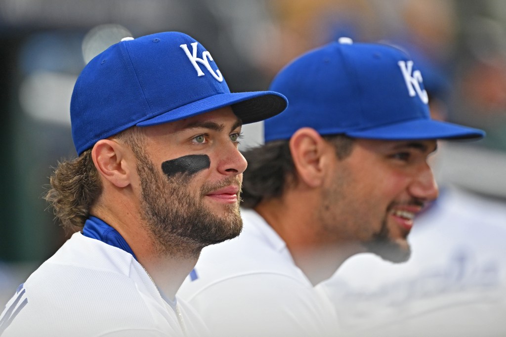 Kansas City Royals players Carter Jensen and Jac Caglianone in their blue hats and white jerseys.