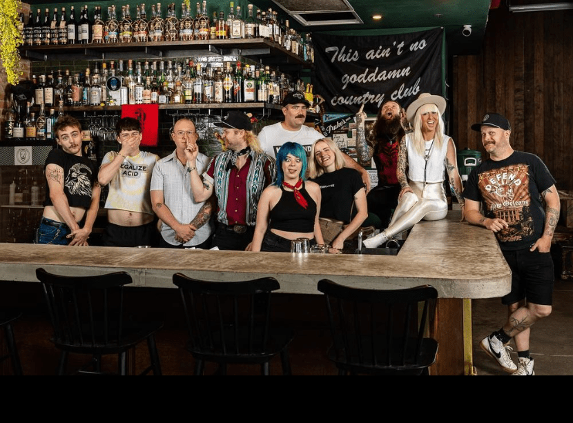 group photo on a bar