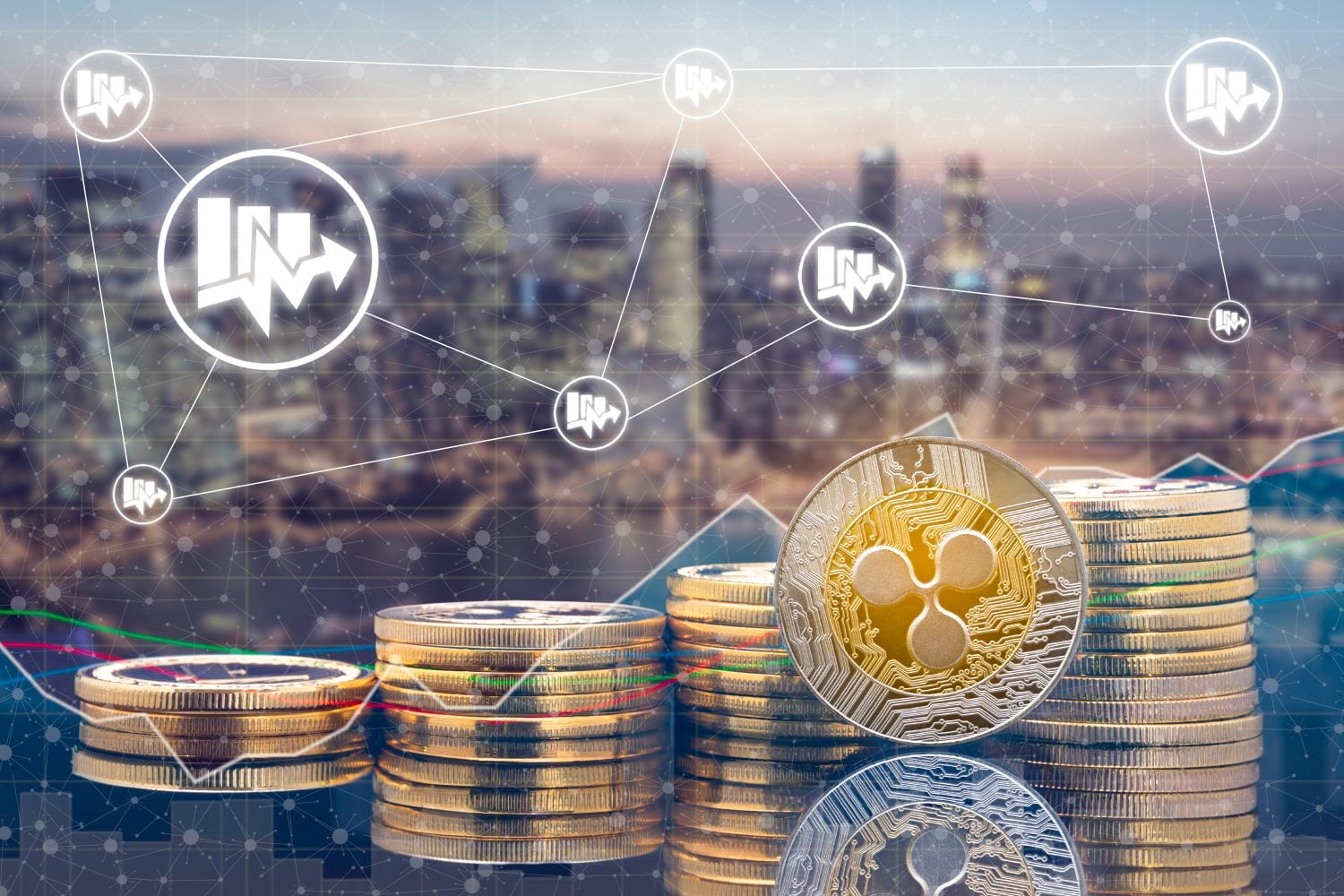 Ripple XRP and cryptocurrency investing concept - Physical Ripple coins with city background and exchange market trading price chart. Blockchain and financial technology.